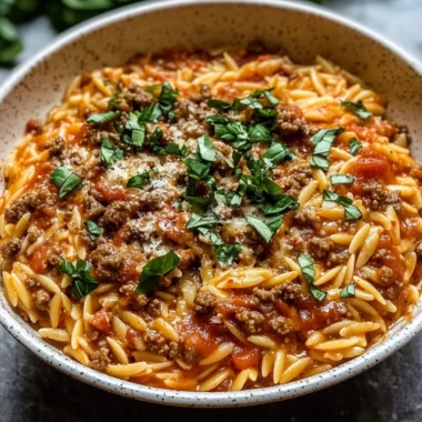 Ground Beef Orzo with Tomato Cream Sauce and Fresh Basil