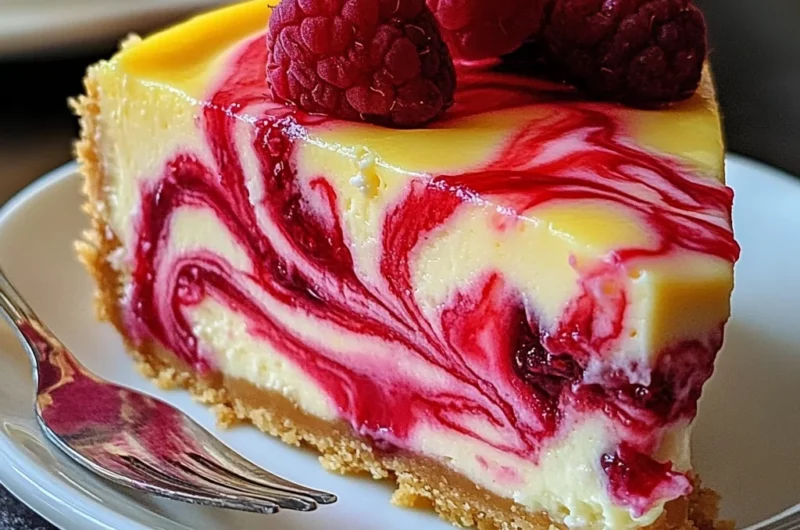 Luscious Lemon Raspberry Swirl Cheesecake